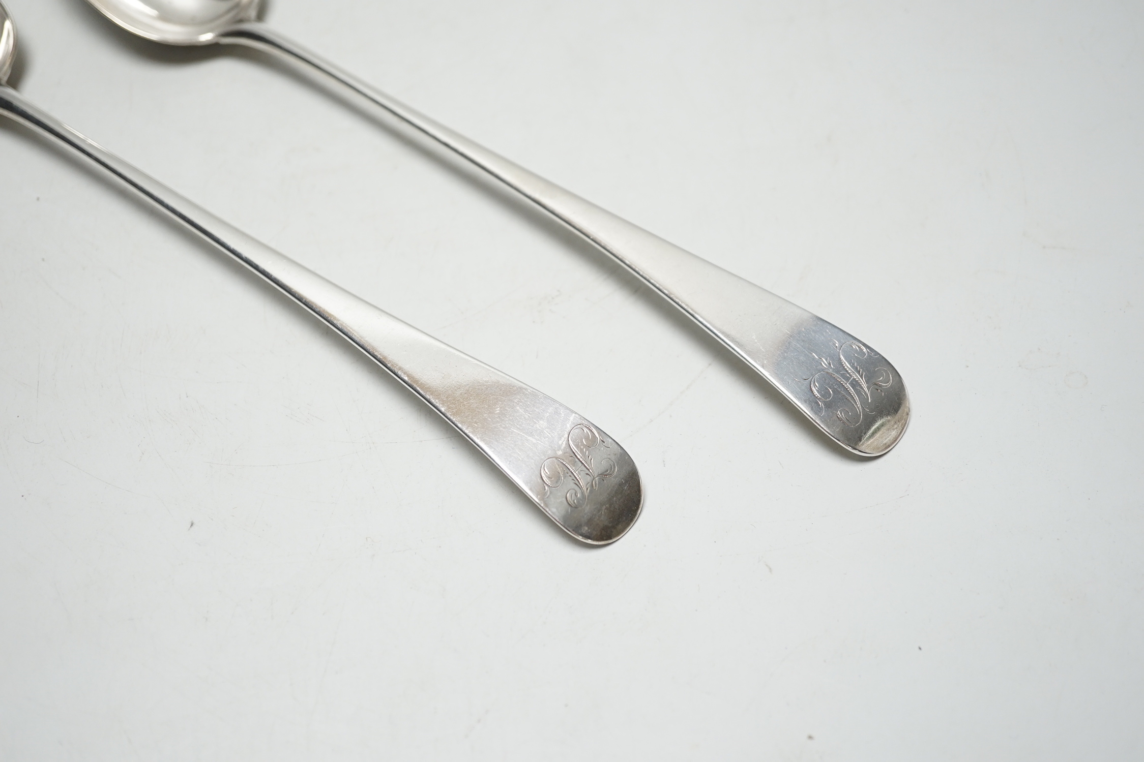 A pair of George III Old English pattern base marked basting spoons, London 1771?, 30cm, 7oz.